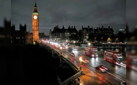 London at night, seen from an elevated traffic-camera viewpoint